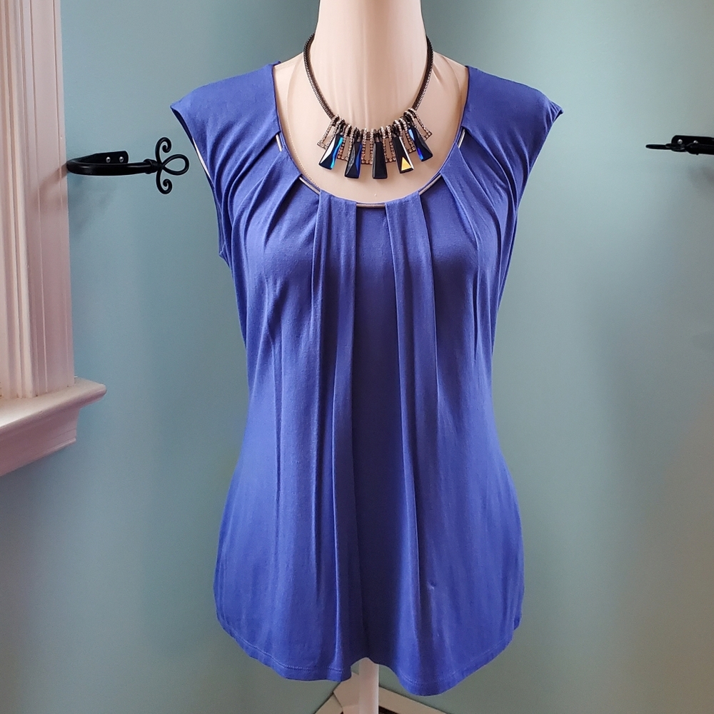 White House Black Market. Sleeveless purple top.
